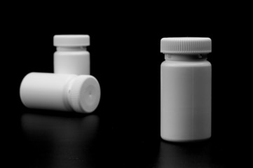 Three supplements bottles
