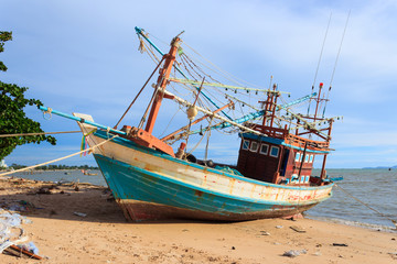 Wooden fishing boat on the beach