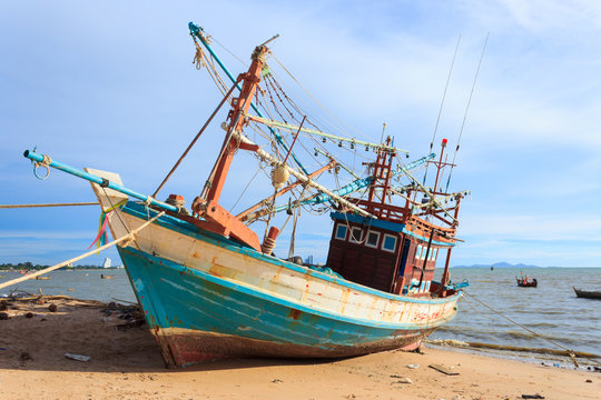 Wooden fishing boat on the beach