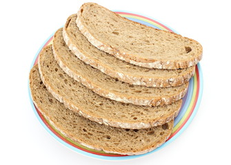 Slices of rye bread and colorful plate