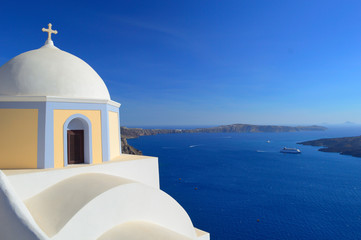 Beautiful church on the caldera and ships in the bay, Fira, Sant - 67568387