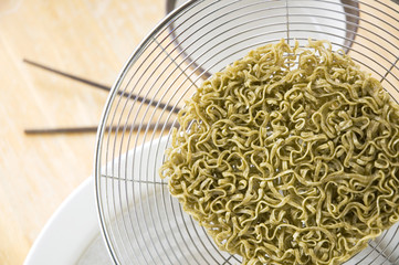 close up green raw noodles