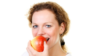 young woman eats an apple