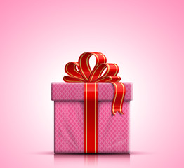 Pink gift box with ribbon and bow