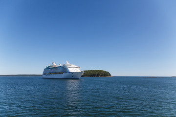 Fototapeta na wymiar Cruise Ship on Blue Horizon