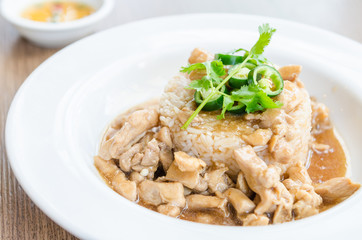 Chicken with brown sauce on rice