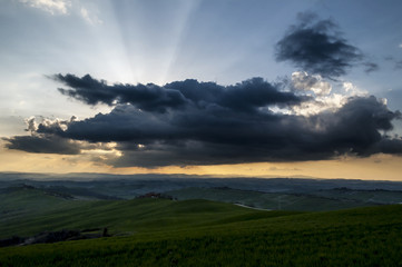 Crete Senesi, sunset and clouds on the plains