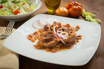 Ossibuchi in salsa, cucina italiana