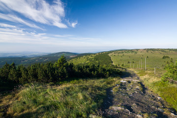 Fototapeta na wymiar Path along the ridge of the mountains in summer