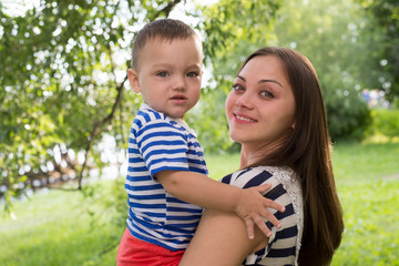 Mother and son. Close up portrait outdoor