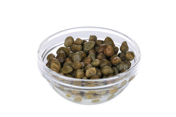 Green capers in a glass bowl.