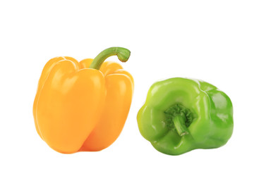 Two green and yellow sweet bell peppers.