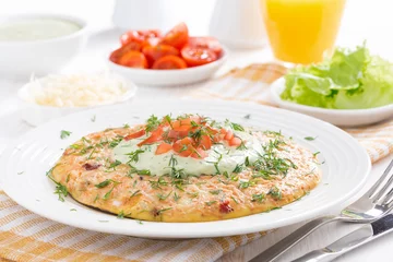 Crédence de cuisine en verre imprimé Oeufs sur le plat dietary omelette with carrot, green yogurt sauce for breakfast