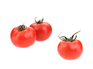 Three fresh tomatoes.