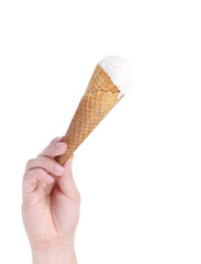 Hand holds ice-cream.