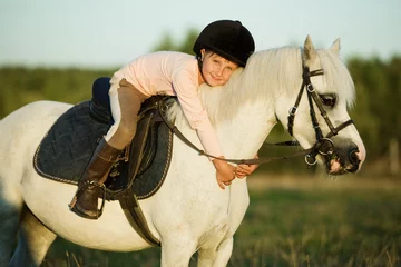 Foto op Canvas Girl riding a horse © andreipugach