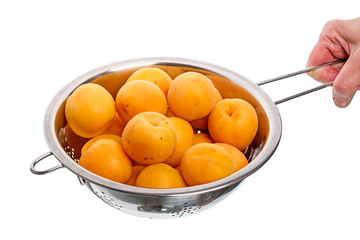 Apricots in a colander