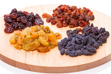 Four different handfuls of raisins