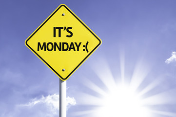 It's Monday road sign with sun background