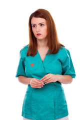 Portrait of thoughtful female doctor or nurse