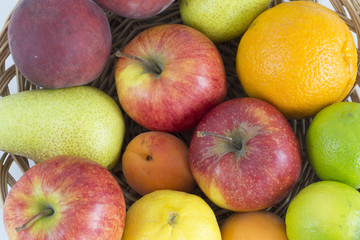 Several fruits in a basket.