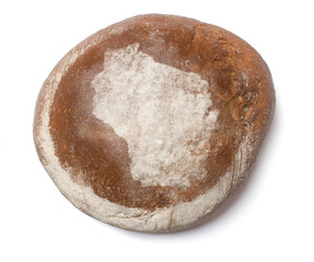 A loaf of fresh bread covered with rye flour in the shape of Wis - obrazy, fototapety, plakaty
