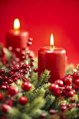 Advent wreath over red background