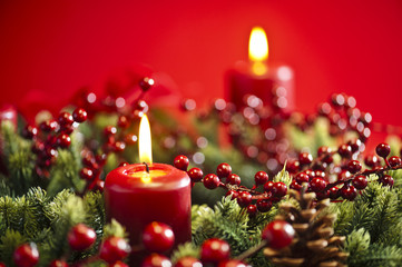 Advent wreath over red background