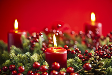 Advent wreath over red background