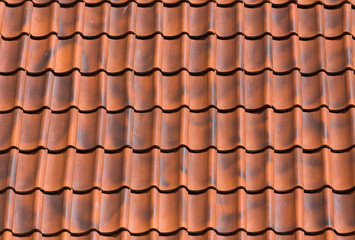 Red tiles roof background