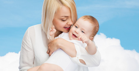 happy mother with smiling baby