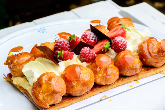 cream cake with raspberries and strawberries