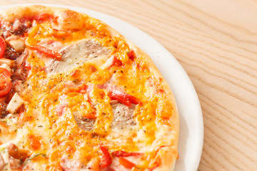 pizza on wood background