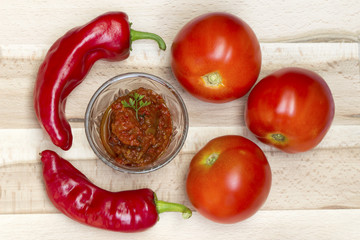 Red hot chili sauce and tomato