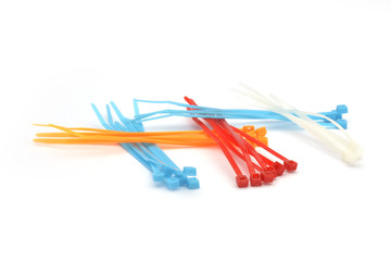 Colored cable ties on white background