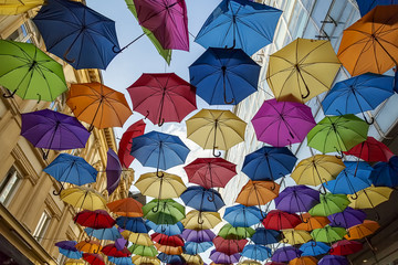 Fototapeta na wymiar Street parasol with colored umbrellas