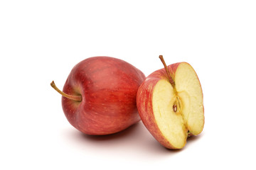Apple and slice on a white background