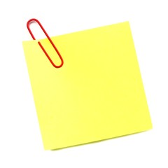 Blank post it note with red paper clip isolated on white