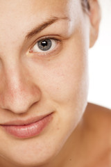 Obraz premium fragment of face of beautiful young women without makeup