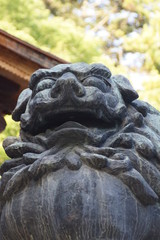 Fototapeta na wymiar 笑顔の阿形狛犬
