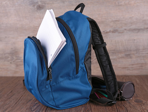 backpack and paper