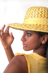 Beautiful Indian woman with yellow hat