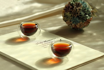 Two cups of Black Tea and holiday album