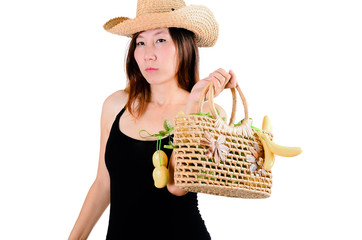 Beautiful woman with vegetables basket, isolated on white. © nuiiko