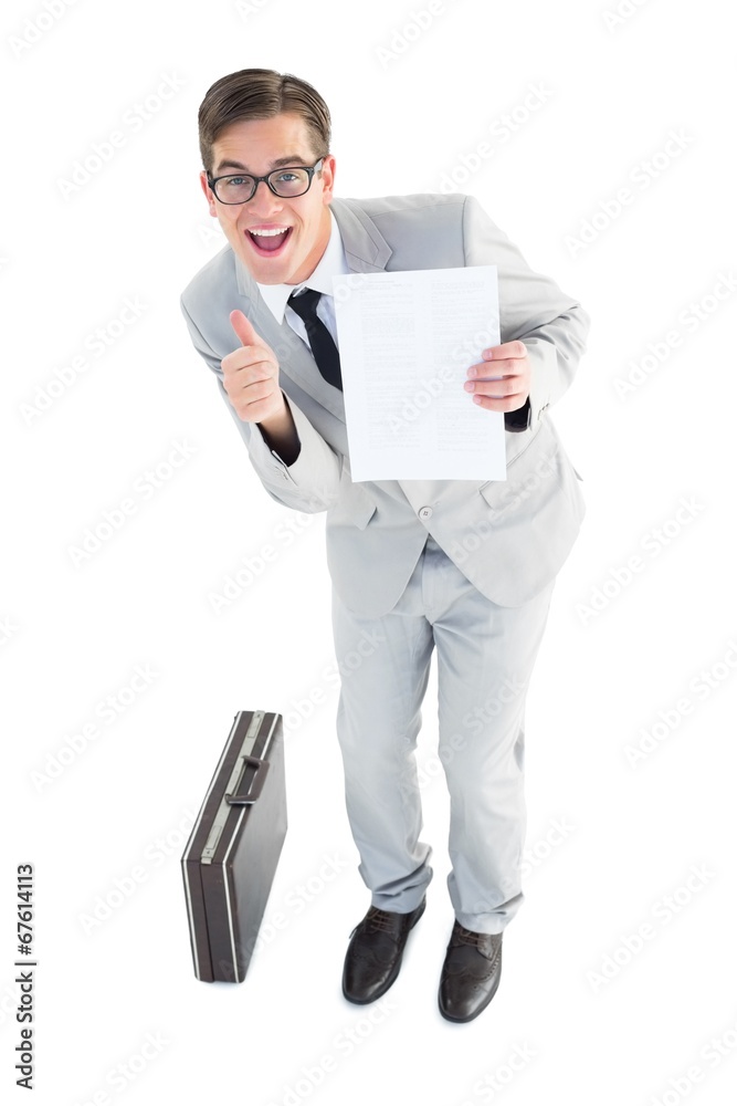Poster Geeky businessman showing page to camera