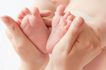 Obraz na płótnie Canvas Baby feet close-up