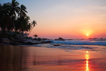 Fototapeten Sonnenuntergang Strand Sunset on the beach  © ZoomTeam