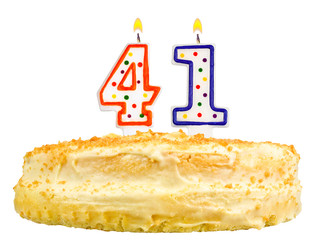 birthday cake with candles number forty one isolated on white