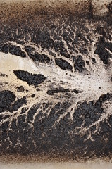 Dirty vertical background of mud left on a bathtub bottom