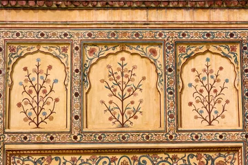 Gordijnen Indian ornament on wall of palace in Jaipur fort India © OlegD